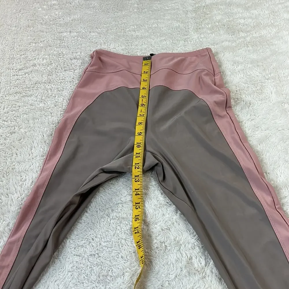 Out From Under Urban Outfitters pink and taupe stirrup leggings, size medium‎